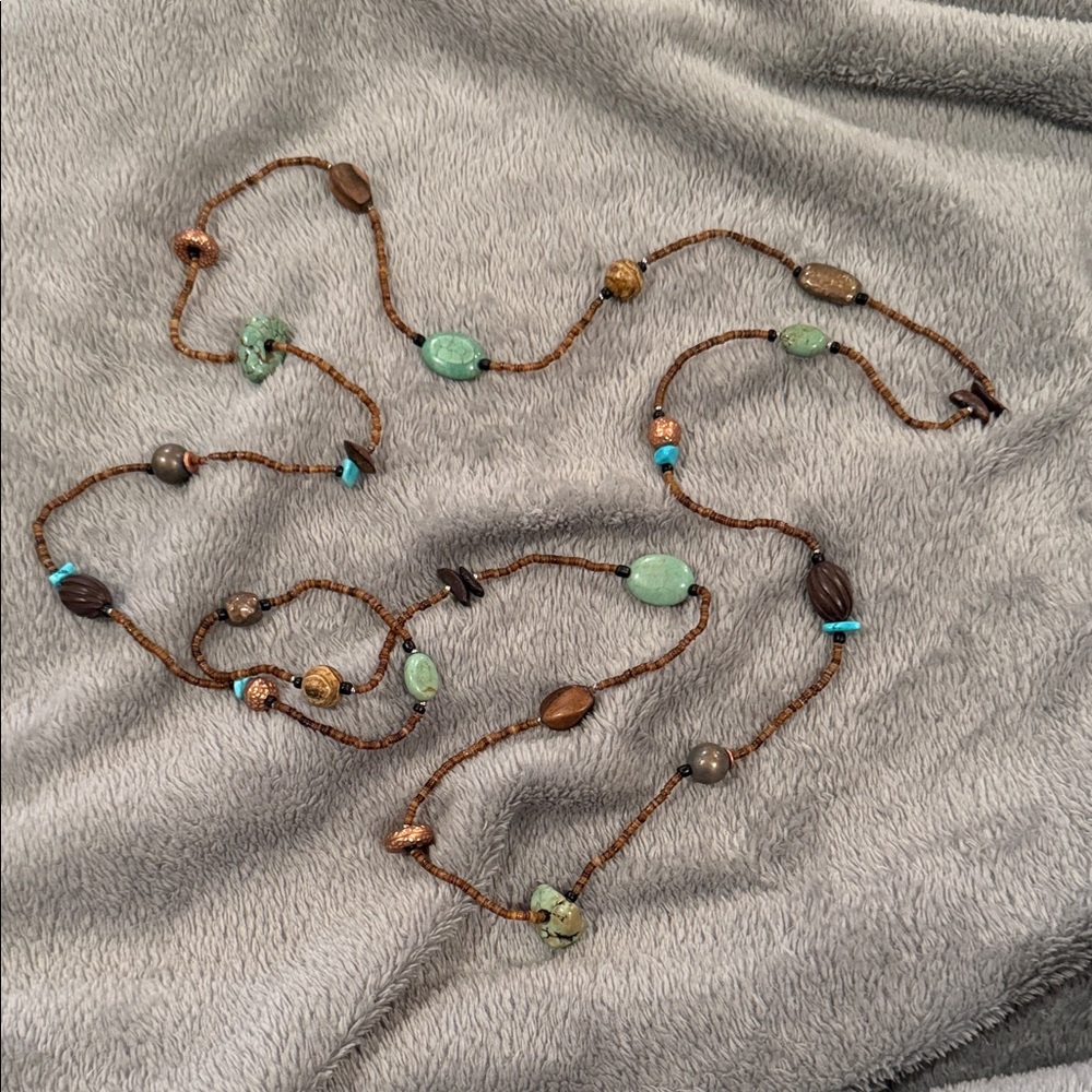Handcrafted Beaded Necklace with Green and Brown Accents